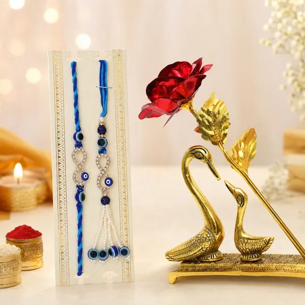 Chhariya_Crafts_Bhaiya_Bhabhi_Bhaiya_Bhabhi_Rakhi_Combo_Gift_Set_Assorted,_Gold,_Gold_Finish,_Jute,_Kundan,_Mauli_Thread,_Pearl,_Yarn_Rakhi,_Chawal_Roli_Pack,_Showpiece__Set_(1_Duck_Showpiece,_1_Chawal_Roli_Pack,_1_Designer_Lumba,_1_Designer_Rakhi)