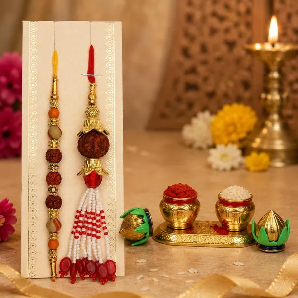 Chhariya_Crafts_Bhaiya_Bhabhi_Bhaiya_Bhabhi_Rakhi_Combo_Gift_Set_Assorted,_Gold,_Gold_Finish,_Jute,_Kundan,_Mauli_Thread,_Pearl,_Yarn_Rakhi,_Chawal_Roli_Pack,_Showpiece__Set_(1_KumKum_Kalash_Box,_1_Chawal_Roli_Pack,_1_Designer_Lumba,_1_Designer_Rakhi)