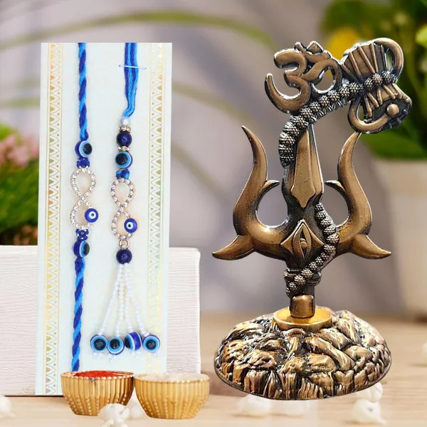 Chhariya_Crafts_Bhaiya_Bhabhi_Bhaiya_Bhabhi_Rakhi_Combo_Gift_Set_Assorted,_Gold,_Gold_Finish,_Jute,_Kundan,_Mauli_Thread,_Pearl,_Yarn_Rakhi,_Chawal_Roli_Pack,_Showpiece__Set_(1_Trisul_,_1_Chawal_Roli_Pack,_1_Designer_Lumba,_1_Designer_Rakhi)