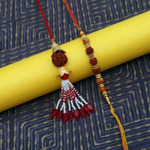 Chhariya_Crafts_Bhaiya_Bhabhi_Bhaiya_Bhabhi_Rakhi_Combo_Gift_Set_Assorted,_Gold,_Gold_Finish,_Jute,_Kundan,_Mauli_Thread,_Pearl,_Yarn_Rakhi,_Chawal_Roli_Pack,_Showpiece__Set_(1_Panchmukhi_Idol,_1_Chawal_Roli_Pack,_1_Designer_Lumba,_1_Designer_Rakhi)