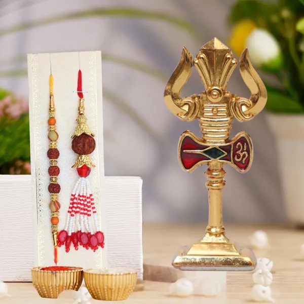 Chhariya_Crafts_Bhaiya_Bhabhi_Bhaiya_Bhabhi_Rakhi_Combo_Gift_Set_Assorted,_Gold,_Gold_Finish,_Jute,_Kundan,_Mauli_Thread,_Pearl,_Yarn_Rakhi,_Chawal_Roli_Pack,_Showpiece__Set_(1_Trisul_Car_Dashboard,_1_Chawal_Roli_Pack,_1_Designer_Lumba,_1_Designer_Rakhi)