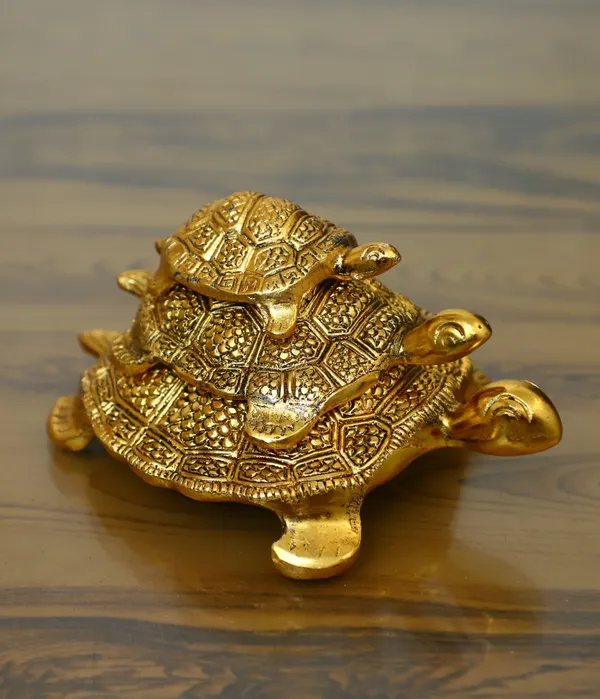 Chhariya_Crafts_Bhaiya_Bhabhi_Bhaiya_Bhabhi_Rakhi_Combo_Gift_Set_Assorted,_Gold_Finish,_Jute,_Pearl,_Plastic_(PVC),_Zardosi_Rakhi,_Showpiece,_Lumba,_Chawal_Roli_Pack__Set_(3_Metal_Tortoise_Showpieces,_1_Chawal_Roli_Pack,_1_Designer_Lumba,_3_Designer_Rakhi)