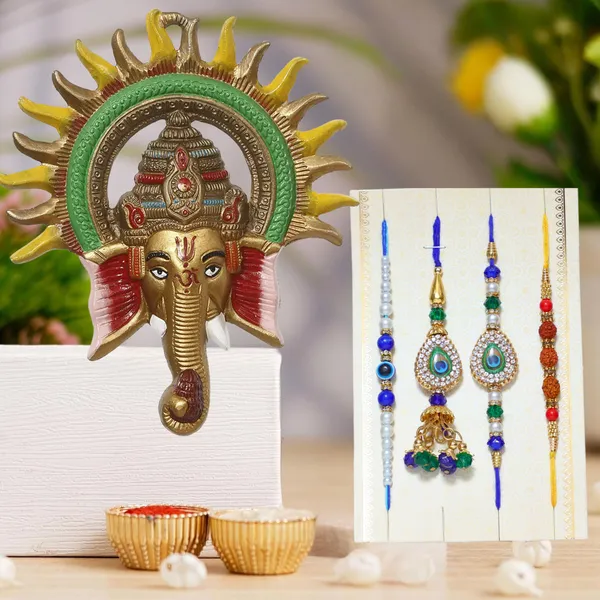 Chhariya_Crafts_Bhaiya_Bhabhi_Bhaiya_Bhabhi_Rakhi_Combo_Gift_Set_Assorted,_Gold_Finish,_Jute,_Pearl,_Plastic_(PVC),_Zardosi_Rakhi,_Showpiece,_Lumba,_Chawal_Roli_Pack__Set_(1_Metal_Ganesh_Showpieces,_1_Chawal_Roli_Pack,_1_Designer_Lumba,_3_Designer_Rakhi)