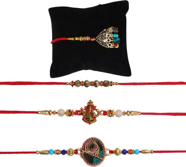 Chhariya_Crafts_Bhaiya_Bhabhi_Bhaiya_Bhabhi_Rakhi_Combo_Gift_Set_Assorted,_Gold_Finish,_Jute,_Pearl,_Plastic_(PVC),_Zardosi_Rakhi,_Showpiece,_Lumba,_Chawal_Roli_Pack__Set_(2_Metal_Diya_Showpieces,_1_Chawal_Roli_Pack,_1_Designer_Lumba,_3_Designer_Rakhi)