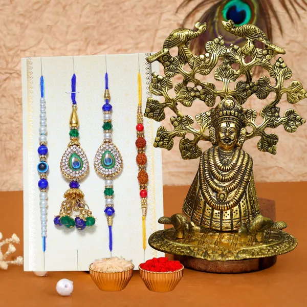 Chhariya_Crafts_Designer_Bhaiya_Bhabhi_Rakhi_Combo_Gift_Set_Assorted,_Gold_Finish,_Jute,_Pearl,_Plastic_(PVC),_Zardosi_Rakhi,_Showpiece,_Lumba,_Chawal_Roli_Pack__Set_(1_Metal_Khatushyam_Ji_Idol,_1_Chawal_Roli_Pack,_1_Designer_Lumba,_3_Designer_Rakhi)