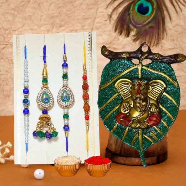 Chhariya_Crafts_Designer_Bhaiya_Bhabhi_Rakhi_Combo_Gift_Set_Assorted,_Gold_Finish,_Jute,_Pearl,_Plastic_(PVC),_Zardosi_Rakhi,_Showpiece,_Lumba,_Chawal_Roli_Pack__Set_(1_Metal_Ganesha_Showpieces,_1_Chawal_Roli_Pack,_1_Designer_Lumba,_3_Designer_Rakhi)