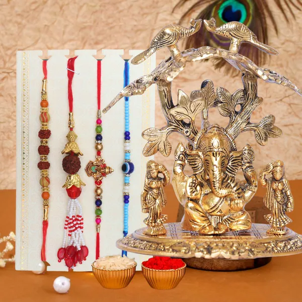 Chhariya_Crafts_Designer_Bhaiya_Bhabhi_Rakhi_Combo_Gift_Set_Assorted,_Gold_Finish,_Jute,_Pearl,_Plastic_(PVC),_Zardosi_Rakhi,_Showpiece,_Lumba,_Chawal_Roli_Pack__Set_(1_Metal_Ganesh_Murti,_1_Chawal_Roli_Pack,_1_Designer_Lumba,_3_Designer_Rakhi)
