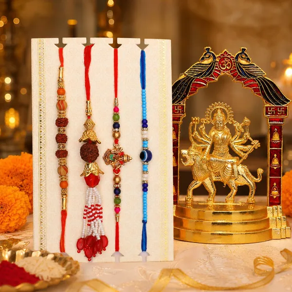 Chhariya_Crafts_Bhaiya_Bhabhi_Bhaiya_Bhabhi_Rakhi_Combo_Gift_Set_Gold_Finish,_Jute,_Pearl,_Plastic_(PVC),_Zardosi_Rakhi,_Showpiece,_Lumba,_Chawal_Roli_Pack__Set_(1_Metal_Durga_Ji_Idol,_1_Chawal_Roli_Pack,_1_Designer_Lumba,_3_Designer_Rakhi)