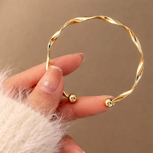 Gold-Tone_Twisted_Cuff_Bracelet_With_Ball_Ends_For_Women
