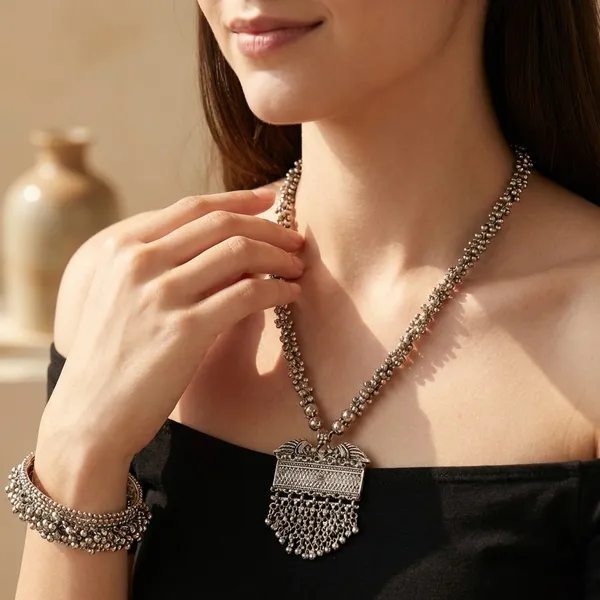 Oxidized_Silver_Tribal_Necklace_Set_With_Hoop_Earrings_And_Bracelet_For_Women_Set_Of_3