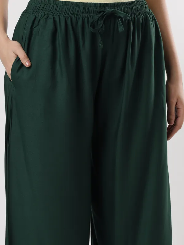 Kohinoorised_Pure_Viscos_Rayon_Palazzo_With_Two_Side_Pockets_With_Miyani_and_Drawstring_Bottlegreen