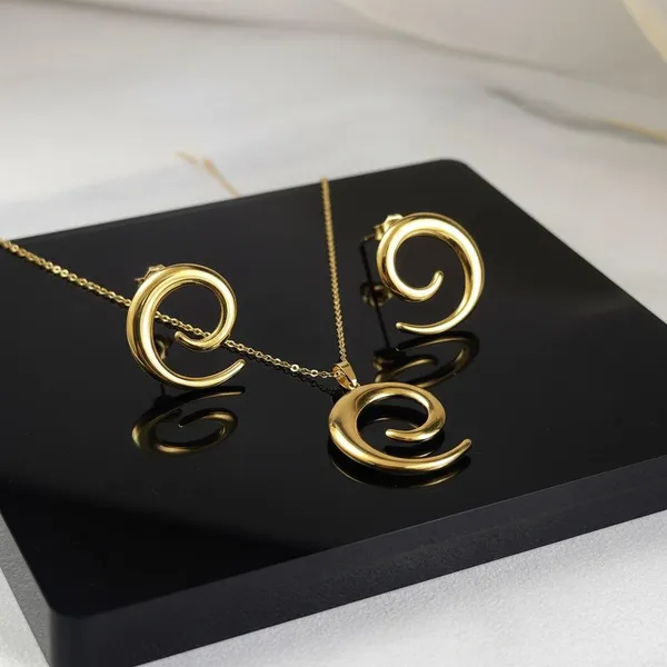 Gold_Spiral_Pendant_Necklace_Set_With_Earrings_|_Modern_Minimal_Swirl_Design_Jewellery_For_Women