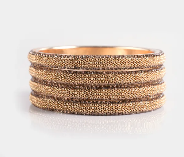 Golden_Alloy_With_Bead_Detailing_Bangles_For_Women_Set_Of_4