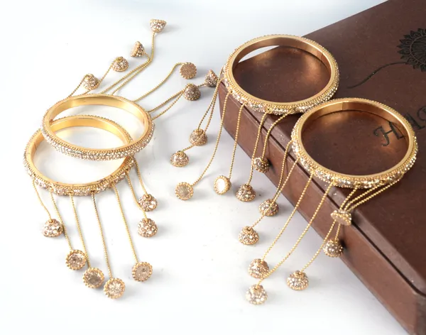 Golden_Alloy_With_Stones_And_Chains_Charm_Hanging_Bangles_For_Women_Set_Of_2