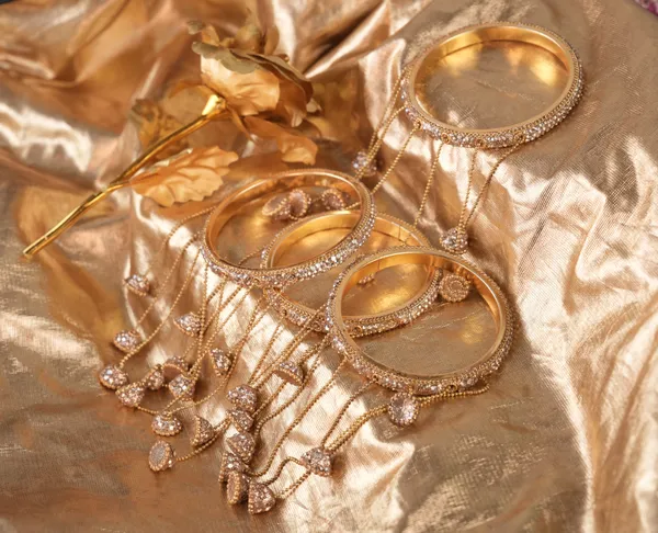 Golden_Alloy_With_Stones_And_Chains_Charm_Hanging_Bangles_For_Women_Set_Of_2