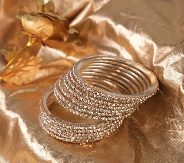 Golden_Alloy_With_Crystal_Studded_Bangles_For_Women