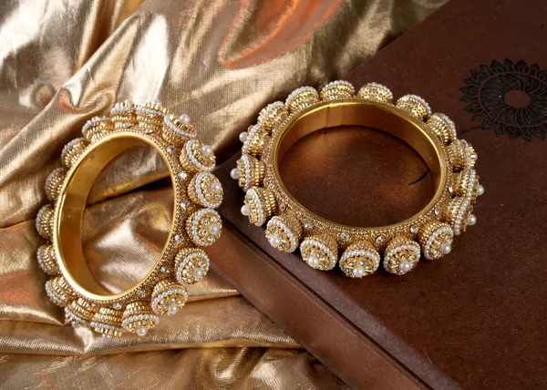 Golden_Alloy_With_Pearl_Studded_Bangles_For_Women_Set_Of_2