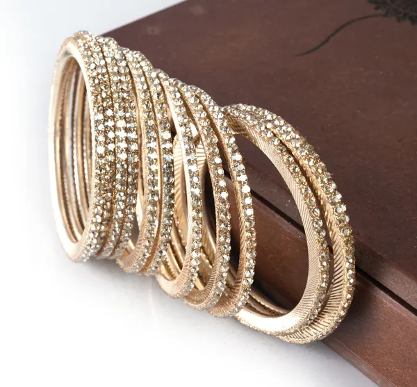 Golden_Alloy_With_Crystal_Studded_Bangles_For_Women