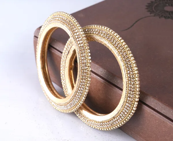 Golden_Alloy_With_Stone_Work_Bangles_For_Women_Set_Of_4