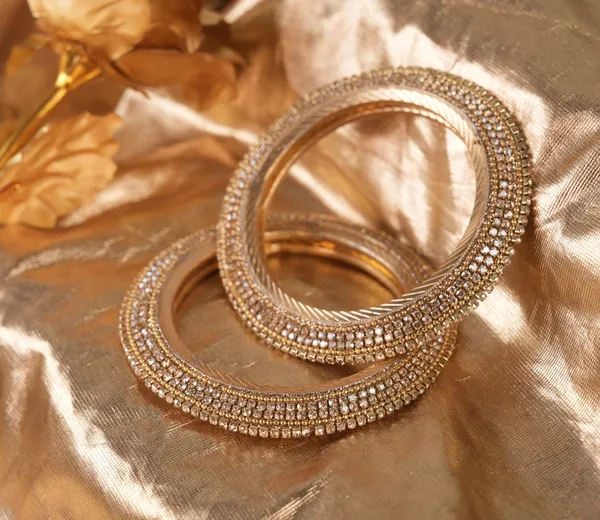 Golden_Alloy_With_Stone_Work_Bangles_For_Women_Set_Of_4