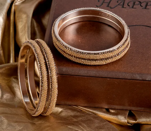Golden_Alloy_With_Bead_Detailing_Bangles_For_Women_Set_Of_4