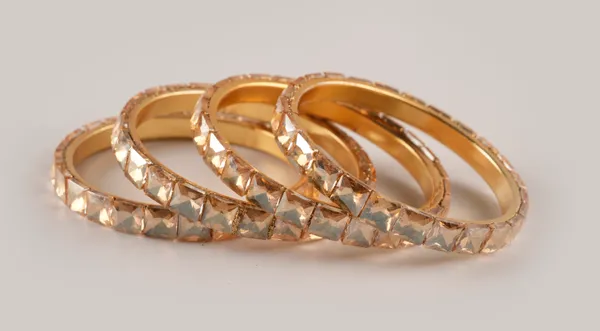Golden_Alloy_With_Gold_Plating_Diamond_Cut_Pattern_Bangles_For_Women_Set_Of_4
