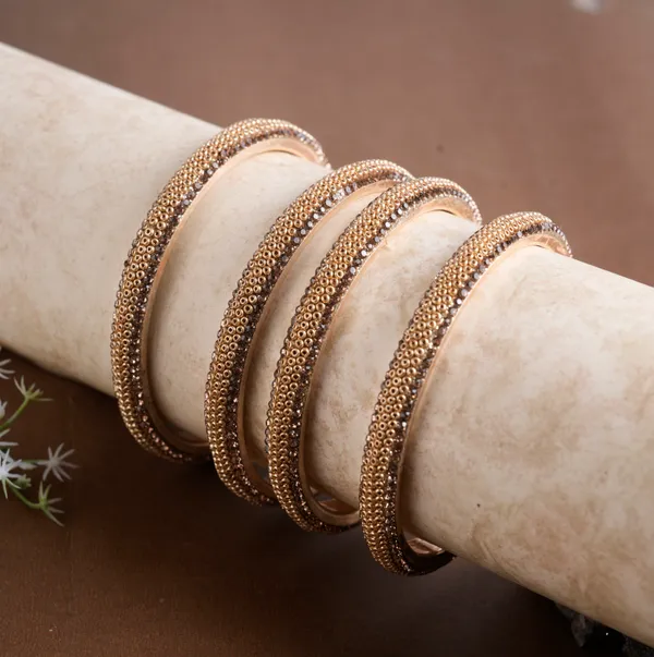 Golden_Alloy_With_Bead_Detailing_Bangles_For_Women_Set_Of_4