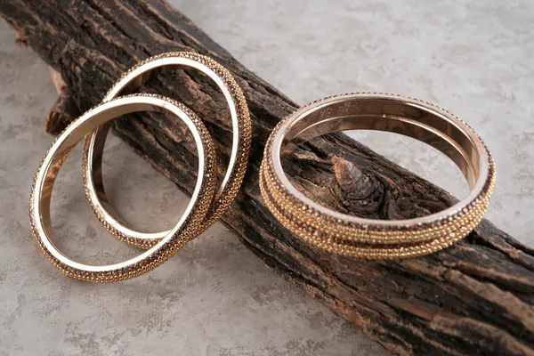 Golden_Alloy_With_Bead_Detailing_Bangles_For_Women_Set_Of_4