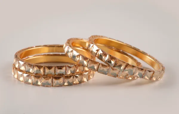 Golden_Alloy_With_Gold_Plating_Diamond_Cut_Pattern_Bangles_For_Women_Set_Of_4