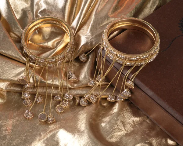 Golden_Alloy_With_Stones_And_Chains_Charm_Hanging_Bangles_For_Women_Set_Of_2