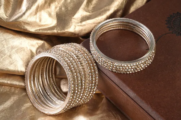 Golden_Alloy_With_Crystal_Studded_Bangles_For_Women