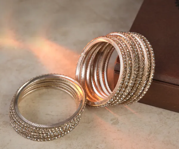 Golden_Alloy_With_Crystal_Studded_Bangles_For_Women