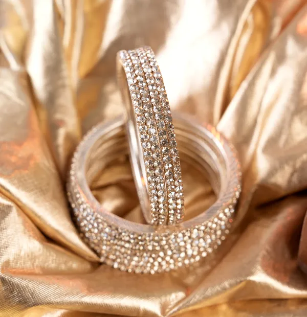 Golden_Alloy_With_Crystal_Studded_Bangles_For_Women