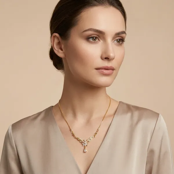 Elegant_Gold_Plated_Floral_Necklace_With_Crystal_Accents