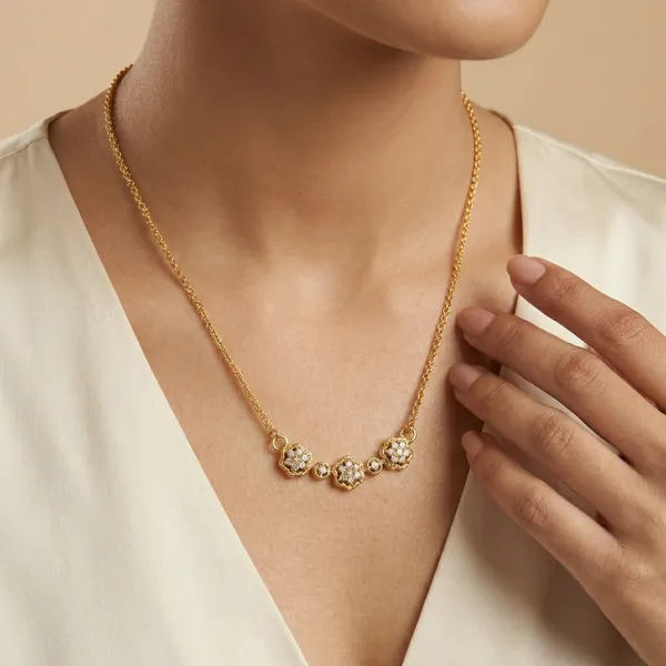 Elegant_Gold_Plated_Floral_Pendant_Necklace_With_Sparkling_Stones
