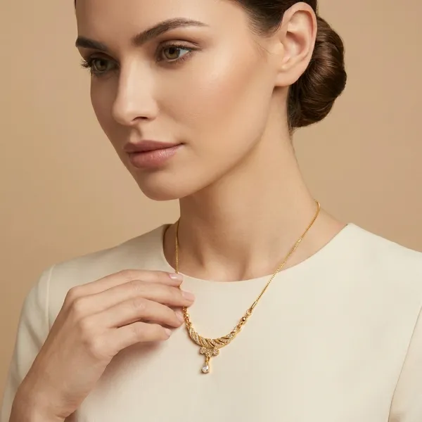 Elegant_Gold_Toned_Crescent_Moon_Necklace_With_Crystal_Accents