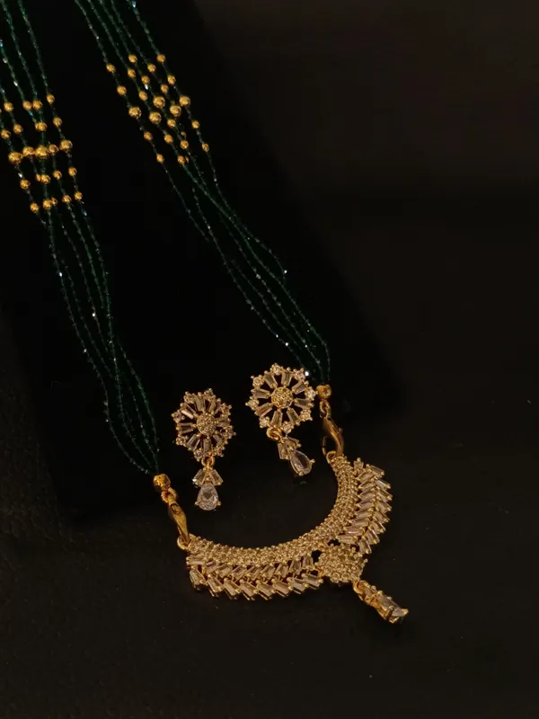 Traditional_Green_Beaded_Necklace_Set_With_Gold_Toned_Pendant_And_Earrings