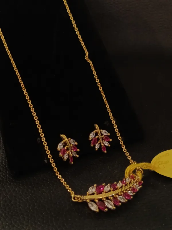 Ruby_And_Diamond_Studded_Leaf_Design_Necklace_Set_With_Earrings