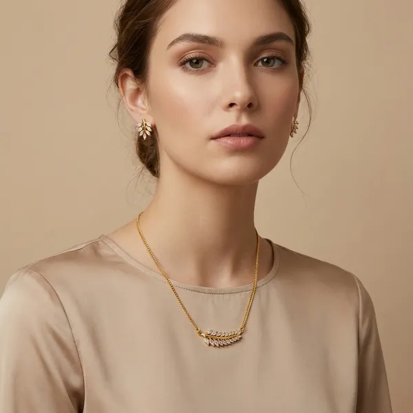 Gold_Plated_Leaf_Design_Pendant_Necklace_With_Matching_Earrings_Set