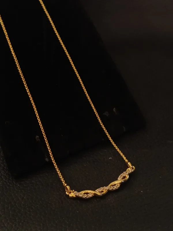 Elegant_Twisted_Gold_Tone_Crystal_Necklace
