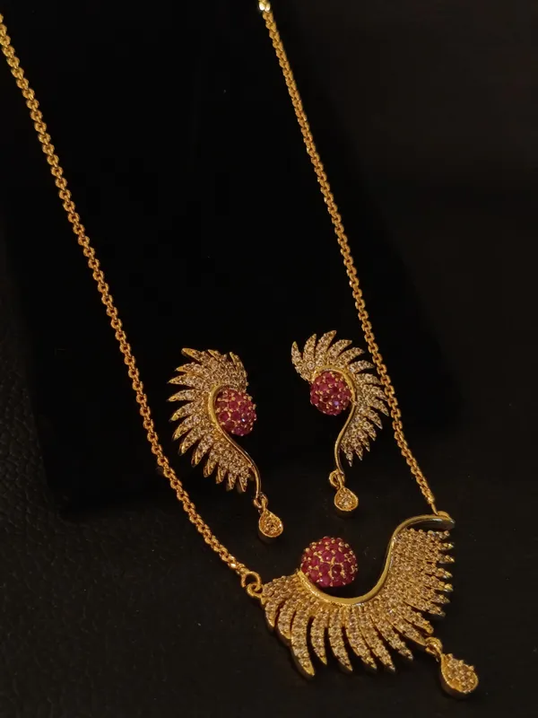 Golden_Peacock_Necklace_Set_With_Ruby_Stones_And_Matching_Earrings
