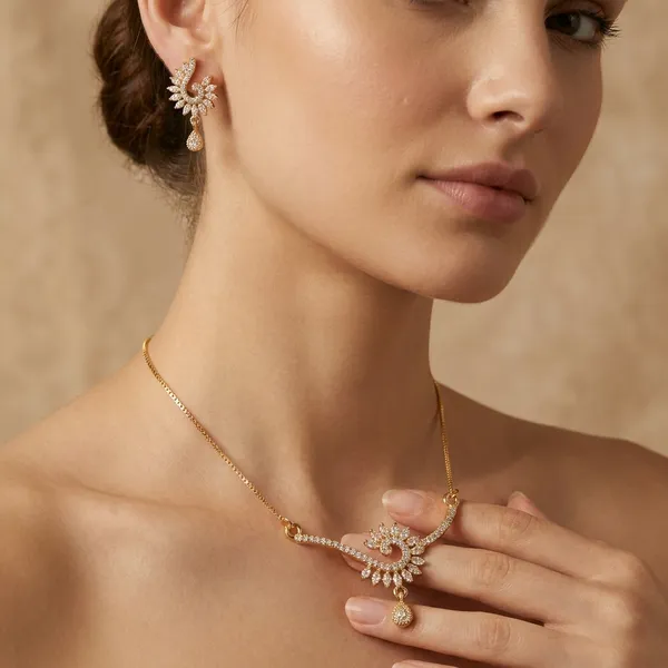 Gold_Toned_American_Diamond_Necklace_Set_With_Floral_Design