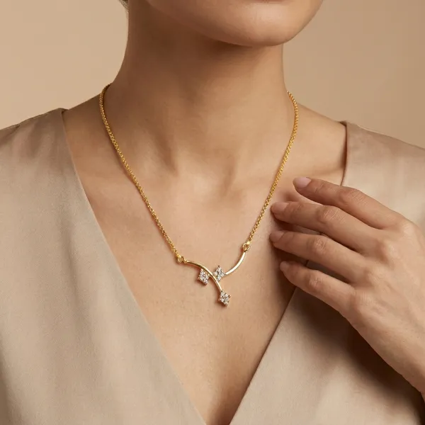 Gold_Toned_Curved_Branch_Pendant_Necklace_With_Crystal_Accents