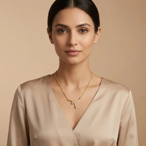 Gold_Toned_Curved_Branch_Pendant_Necklace_With_Crystal_Accents