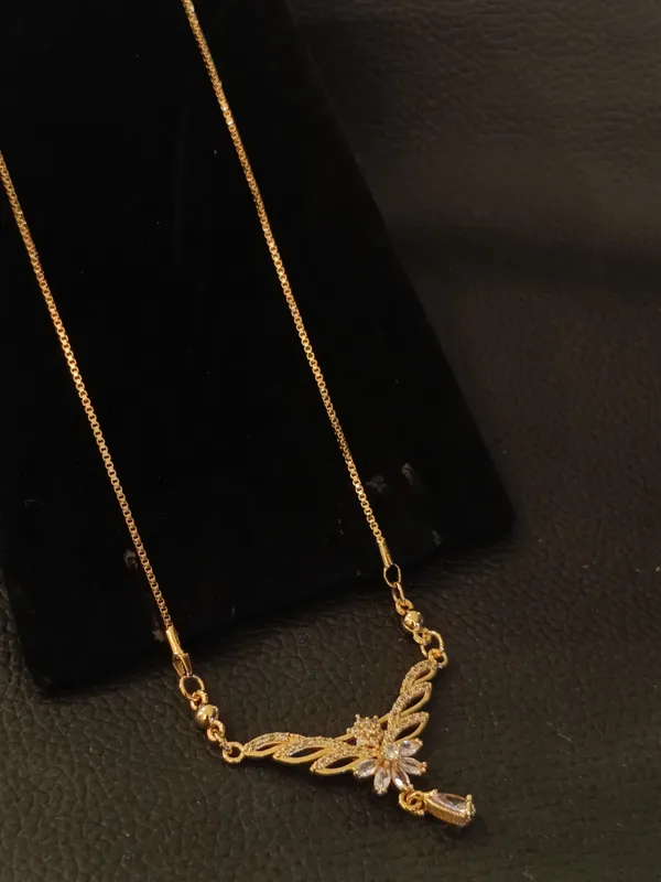 Elegant_Gold_Plated_Floral_Necklace_With_Crystal_Accents