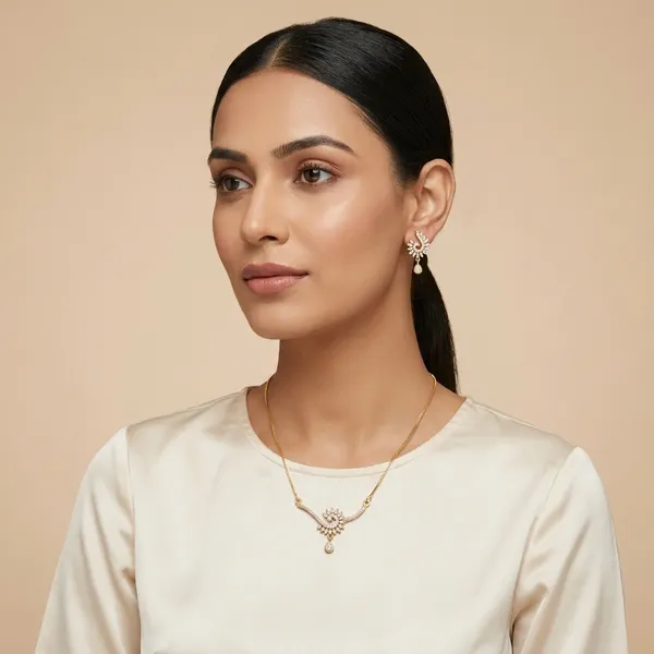 Elegant_Gold_Toned_Crystal_Floral_Necklace_Set_With_Matching_Earrings