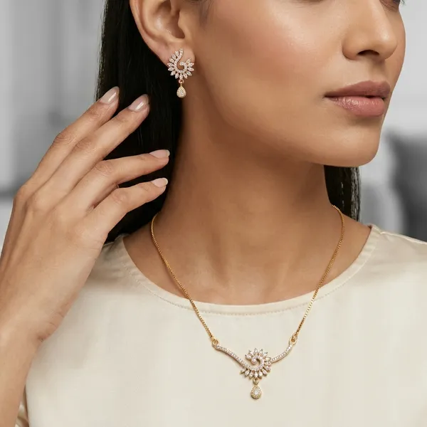 Elegant_Gold_Toned_Crystal_Floral_Necklace_Set_With_Matching_Earrings