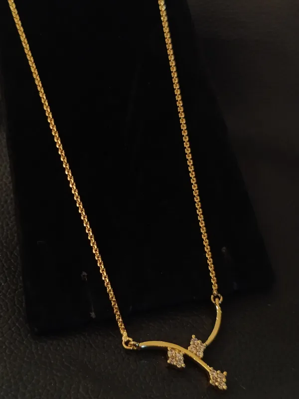 Gold_Toned_Curved_Branch_Pendant_Necklace_With_Crystal_Accents