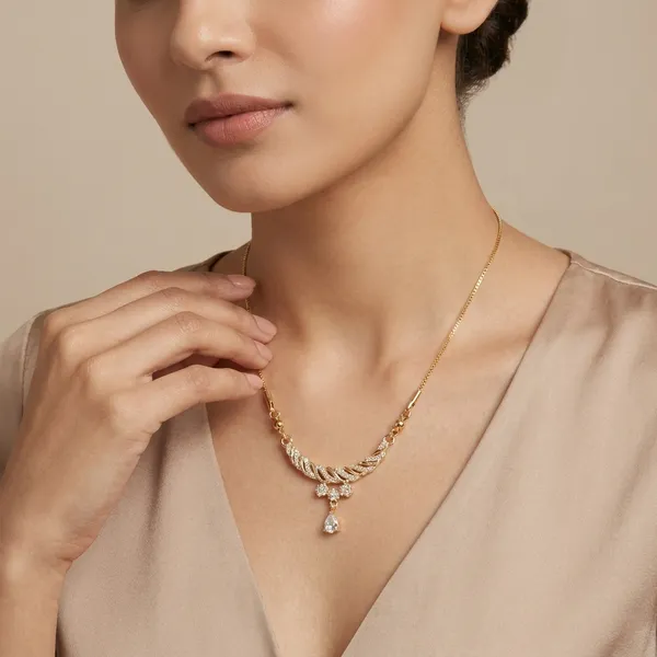 Elegant_Gold_Tone_Floral_Necklace_With_Crystal_Pendant