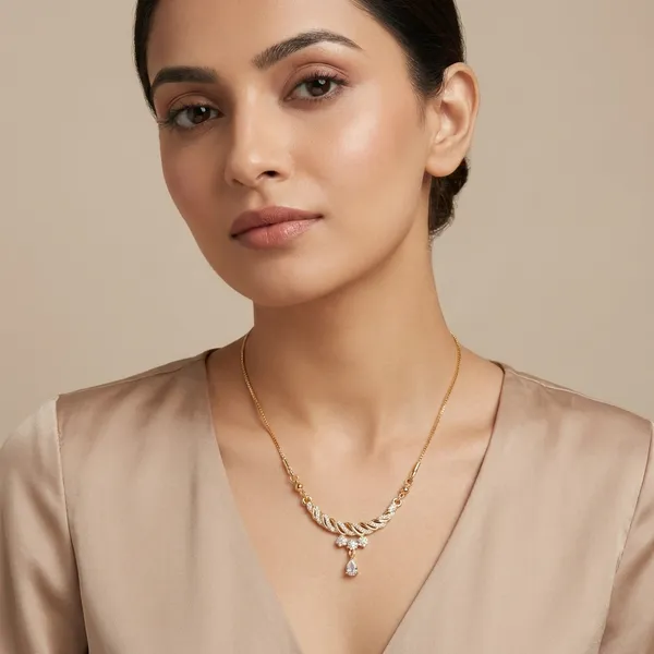 Elegant_Gold_Tone_Floral_Necklace_With_Crystal_Pendant